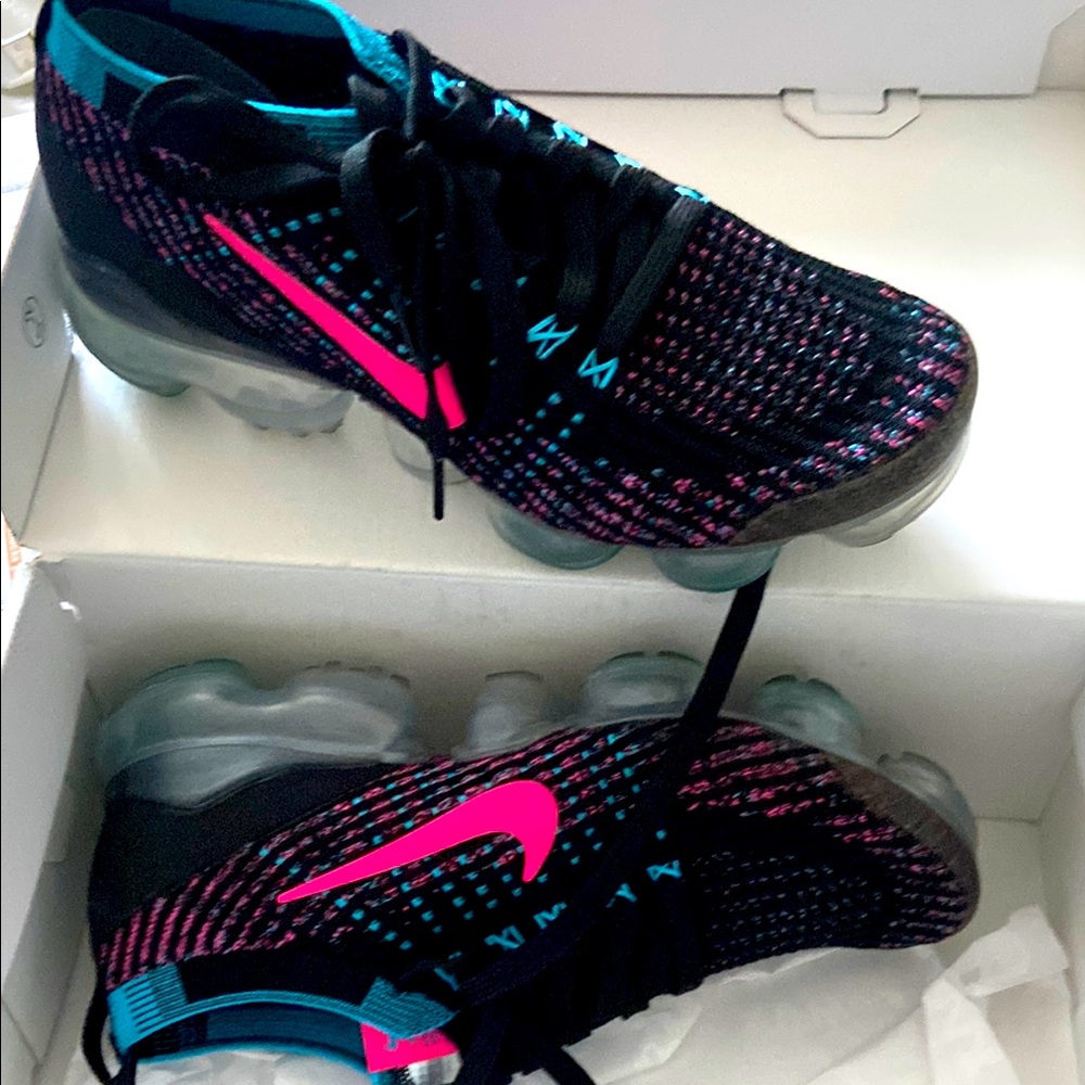 Nike Black and Pink Sneakers with Breathable Mesh Design